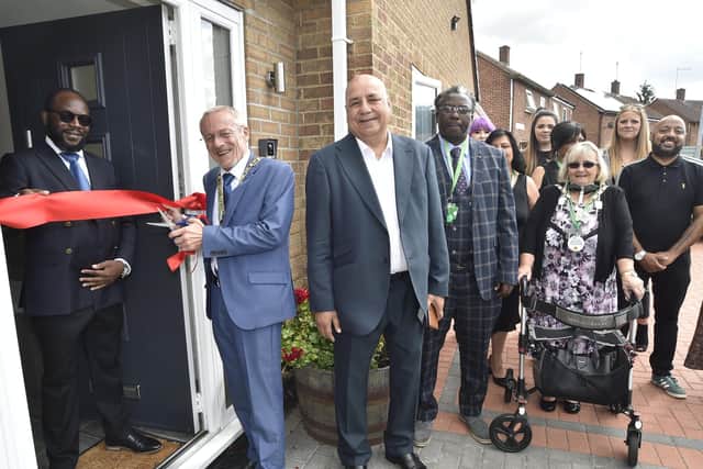 Mayor of Peterborough Stephen Lane and Mayoress Margaret Lane at the opening of a new  24/7 Support UK childrens' home at Walton with (left) director Nyasha Banhire.