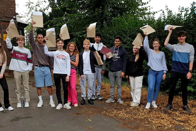 Pupils picking up their results at The King's School