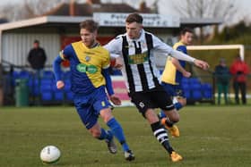 Connor Pilbeam (stripes) scored a hat-trick for Peterborough Northern Star against Biggleswade United.