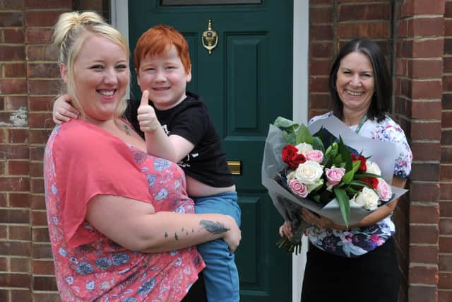 Devon with her son Steven together with Cross Keys Homes’ Voids and Lettings Adviser, Louise Richardson.