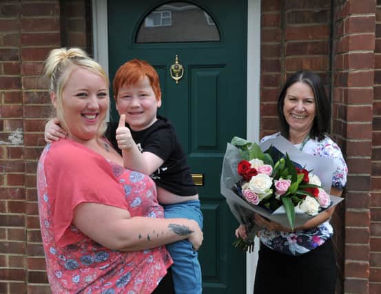 Devon with her son Steven together with Cross Keys Homes’ Voids and Lettings Adviser, Louise Richardson.
