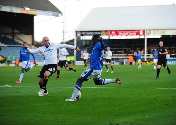 Saido Berahino scores for Posh against Derby at London Road in 2012.