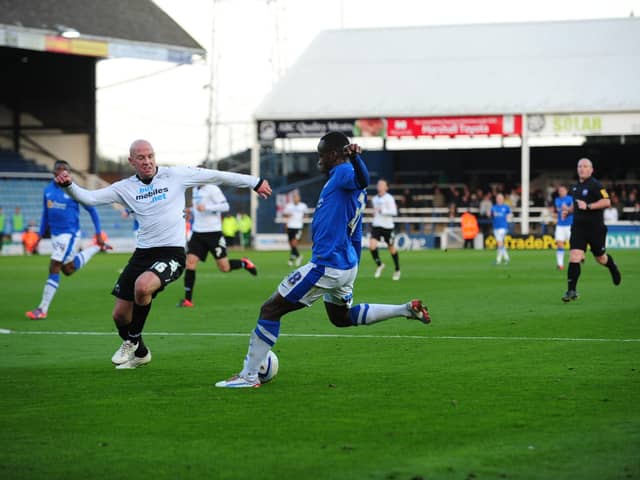 Saido Berahino scores for Posh against Derby at London Road in 2012.
