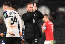 Wayne Rooney leads the applause after Derby's win over League Two side Salford in the Carabao Cup. Photo: Tony Marshall Getty Images