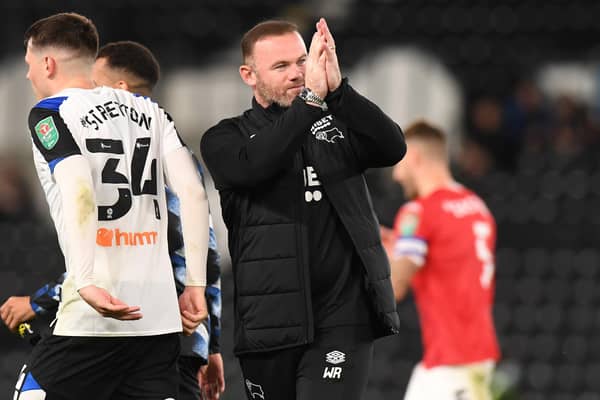 Wayne Rooney leads the applause after Derby's win over League Two side Salford in the Carabao Cup. Photo: Tony Marshall Getty Images