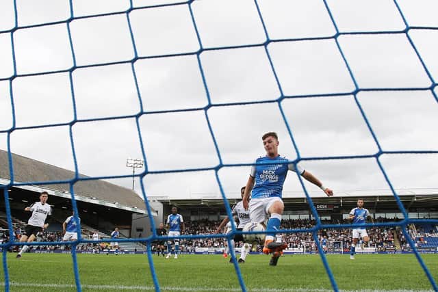 Harrison Burrows of Peterborough United scores the equalising goal against Derby County. Photo: Joe Dent/theposh.com.