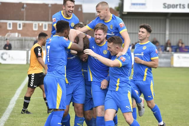 Peterborough Sports celebrate their first goal in a 2-0 win over Rushall Olympic. Photo: David Lowndes.