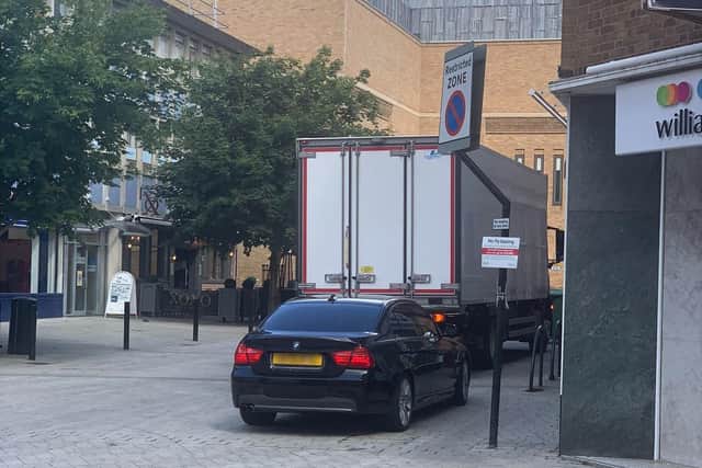 A lorry and car in a restricted and no loading zone on King Street. Photo: Darren Ferreday.
