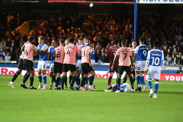 A melee between Posh and Cardiff City players. Photo: David Lowndes.