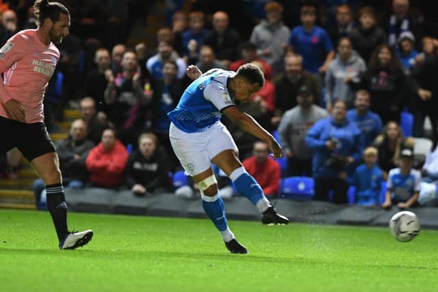 Posh striker Jonson Clarke-Harris shoots at the Cardiff goal. Photo: David Lowndes.