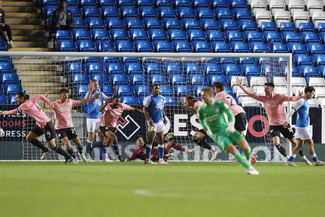 Cardiff City players celebrate their last-gasp equaliser against Posh. Photo: Joe Dent/theposh.com.