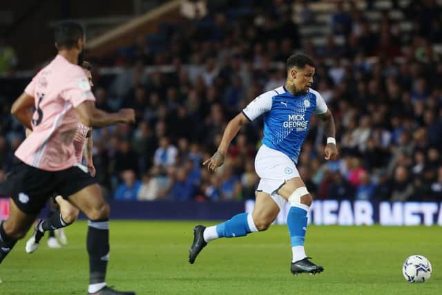 Jonson Clarke-Harris of Peterborough United in action against Cardiff City. Photo: Joe Dent/theposh.com