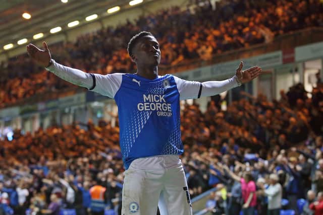 Siriki Dembele of Peterborough United celebrates his goal against Cardiff. Photo: Joe Dent/theposh.com.