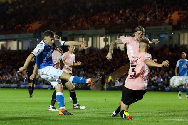 Harrison Burrows of Peterborough United scores the opening goal of the game against Cardiff City. Photo: Joe Dent/theposh.com