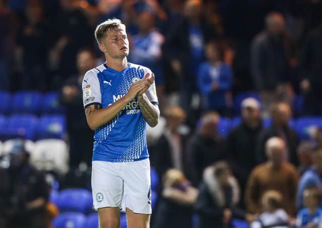 Frankie Kent applauds the Posh fans after the draw with Cardiff. Photo: Joe Dent/theposh.com.