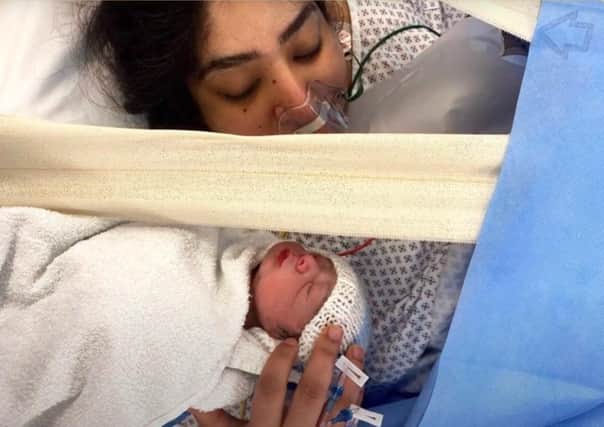 Hajrah and Huzayfah shortly after she gave birth.