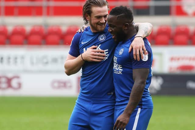 Junior Morias (right) with Jack Marriott during their time together at Posh.