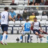 Patrick Bauer of Preston North End scores the only goal against Posh as defender Josh Knight (12) looks on. Photo: Joe Dent/theposhcom.