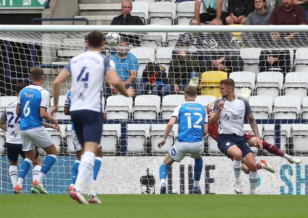 Patrick Bauer of Preston North End scores the only goal against Posh as defender Josh Knight (12) looks on. Photo: Joe Dent/theposhcom.