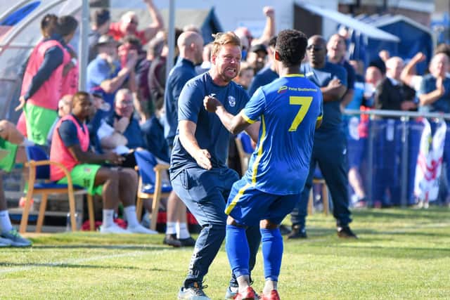 Jimmy Dean celebrates with Dion Sembie-Ferris. Photo: James Richardson.