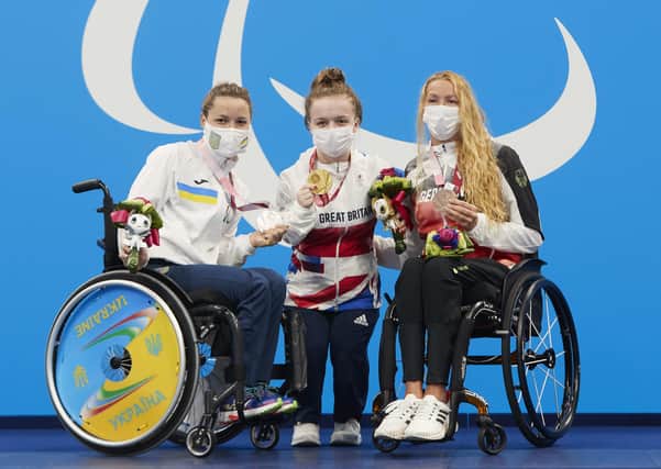 Inpirational Paralympians... Picture provided by ParalympicsGB/imagecomms of Great Britain's Maisie Summers-Newton (centre) celebrates with her gold medal after winning the women's 200m Individual Medley SM6 alongside second placed Ukraine's Yelyzaveta Mereshko (left) with her silver medal and third placed Germany's Verena Schott with her bronze medal during day two of the Tokyo 2020 Paralympic Games at the Tokyo International Forum in Japan.