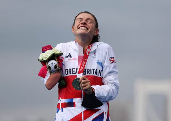 Gold medalist Lauren Steadman of Team Great Britain reacts during the women's PTS5 Triathlon medal ceremony on day 5 of the Tokyo 2020 Paralympic Games at Odaiba Marine Park. Photo: Alex Pantling/Getty Images.