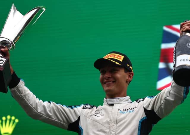 George Russell celebrates the first podium finish at te Belgian Grand Prix. Photo: Mark Thompson/Getty Images.