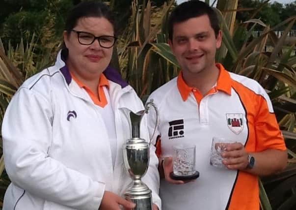 Stephen and Louise Harris with their National Under 25 pairs trophies.
