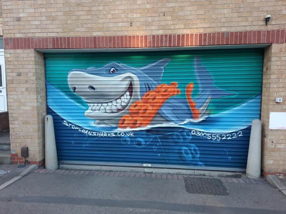 The mural is designed to raise awareness of the dangers of using loan sharks