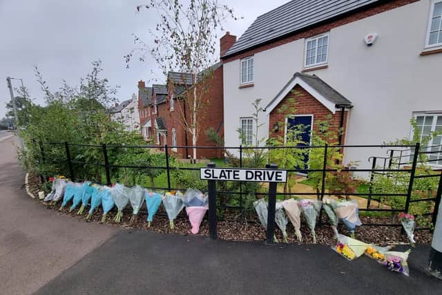 Flowers have been left at the scene in Slate Drive, Kettering.
