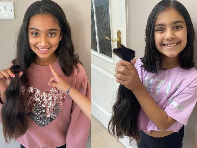 Lily (left) and Lana with the hair they had cut off for the Little Princess Trust.