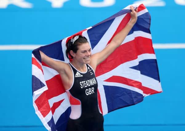 PPeterborough's Lauren Steadman of Team Great Britain reacts as she crosses the finish line to win the gold medal in the women's PTS5 Triathlon on day 5 of the Tokyo 2020 Paralympic Games at Odaiba Marine Park on August 29, 2021. (Photo by Alex Pantling/Getty Images)