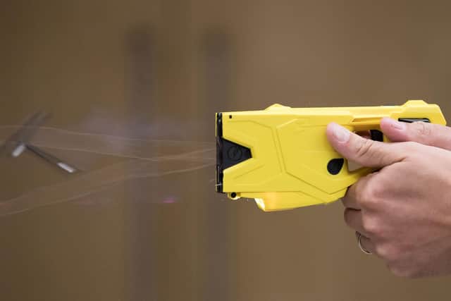 Police in Cambridgeshire used Tasers hundreds of times in a year, figures show. Photo: PA EMN-210309-135553001