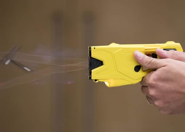 Police in Cambridgeshire used Tasers hundreds of times in a year, figures show. Photo: PA EMN-210309-135553001