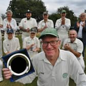 Nigel King received an award from his team mates after playing 1000 games for Castor Cricket Club  Photo: David Lowndes.