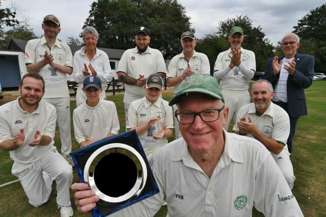 Nigel King received an award from his team mates after playing 1000 games for Castor Cricket Club Photo: David Lowndes.