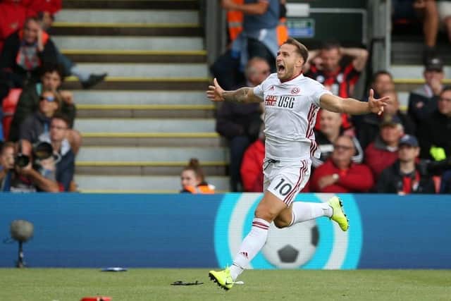 Billy Sharp celebrates a Premier League goal for Sheffield United in 2019. Photo: Steve Bardens/Getty Images.