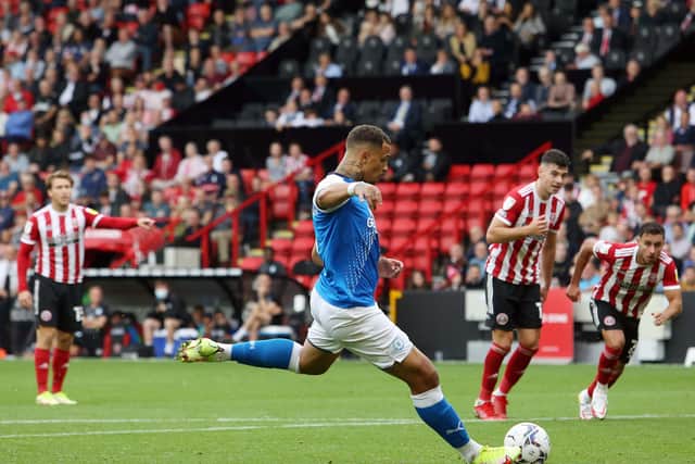 Jonson Clarke-Harris of Peterborough United scores a consolation goal from the penalty sport against Sheffield United. Photo: Joe Dent/theposh.com.