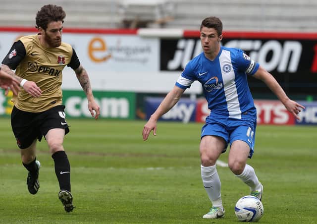 Tommy Rowe (right) in action for Posh. Photo: Pete Norton Getty Images.