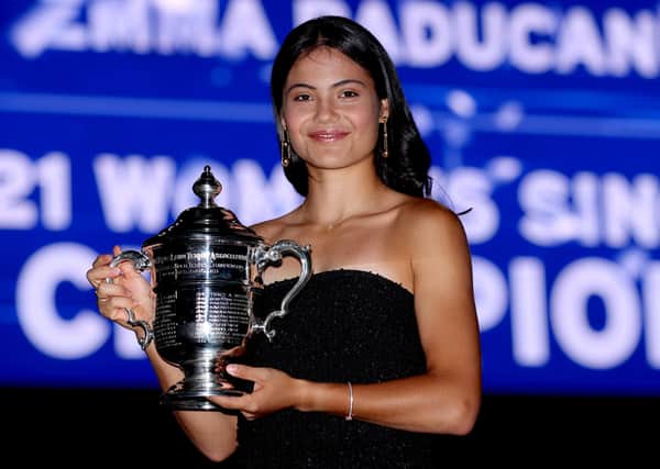 Emma Raducanu poses with the US Open trophy. Photo: Matthew Stockman/Getty Images.