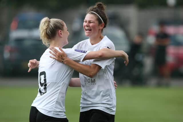 Keir Perkins (left) scored for Posh Women at Long Eaton.