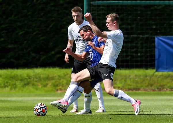 Danny Drinkwater (blue) playing for Chelsea against Posh in the summer.