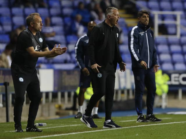Peterborough United Manager Darren Ferguson shouts encouragement to his players from the touchline at Reading. Photo: Joe Dent/theposh.com.