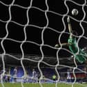 Luke Southwood of Reading makes a diving save to deny a shot from Oliver Norburn of Peterborough United - Mandatory by-line: Joe Dent/JMP - 14/09/2021 - FOOTBALL - Select Car Leasing Stadium - Reading, England - Reading v Peterborough United - Sky Bet Championship