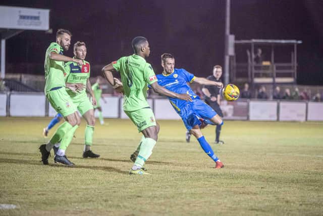Action from Peterborough Sports (blue) v Tamworth. Photo: James Richardson.
