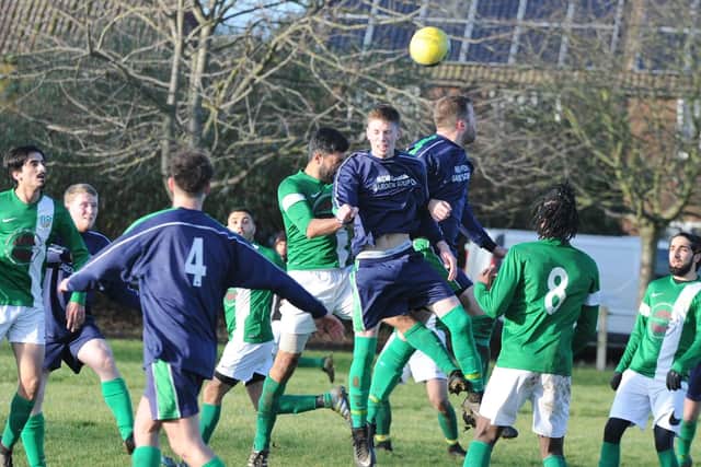 Eye United (purple) in action in a Peterborough League game in 2018.