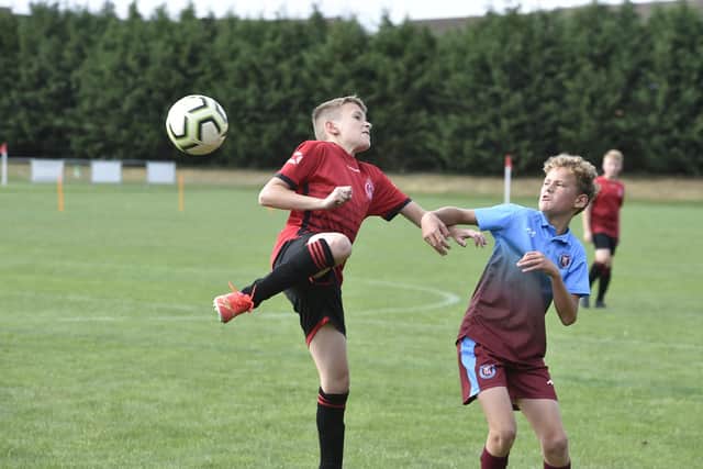 Action from Polonia (red) 2, Thorpe Wood Rangers 6 in Division One of the Junior Alliance Under 12 League. Photo: David Lowndes.