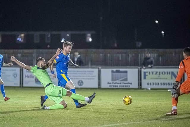Action from Peterborough Sports' (blue) win over Tamworth. Photo: James Richardson.