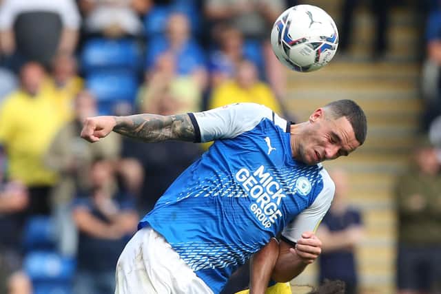 Oliver Norburn of Peterborough United in action against Birmingham City. Photo: Joe Dent/theposh.com.