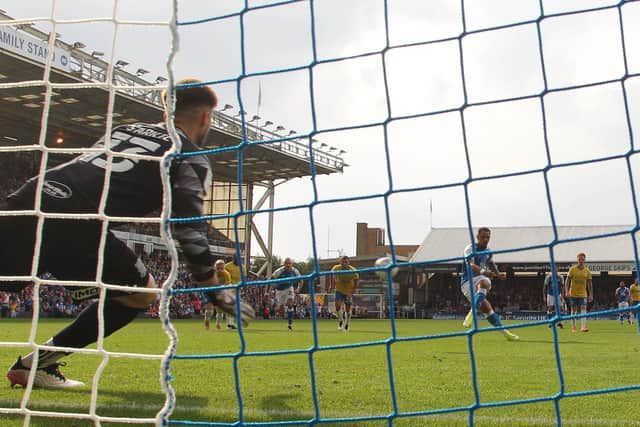 Jonson Clarke-Harris of Peterborough United scores the second goal against Birmingham from the penalty spot. Photo: Joe Dent/theposh.com.